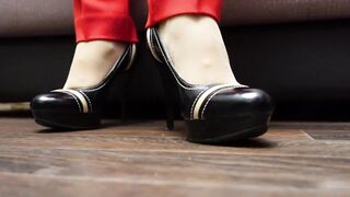 Mistress shows her legs in shoes and nylon socks